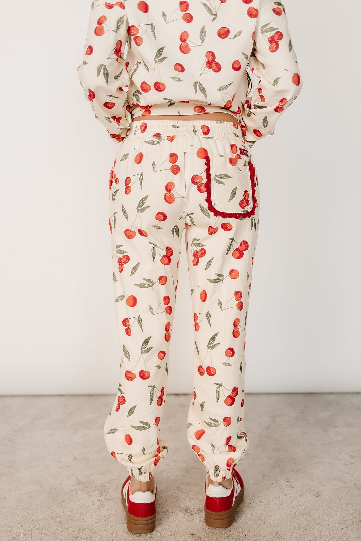 BEVIQUEEN Lace Pocket Joggers - Cherry Charmed
